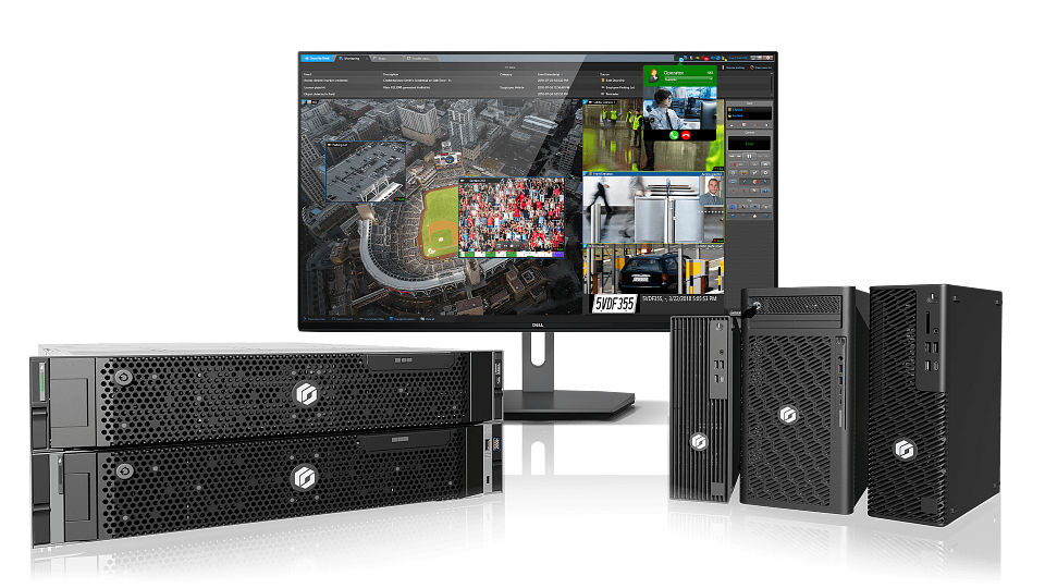 Genetec Security Center SaaS monitoring multiple camera views on a desktop screen, surrounded by Cloudlink appliances, controllers, and a mobile device, representing a SaaS security platform that supports many devices.
