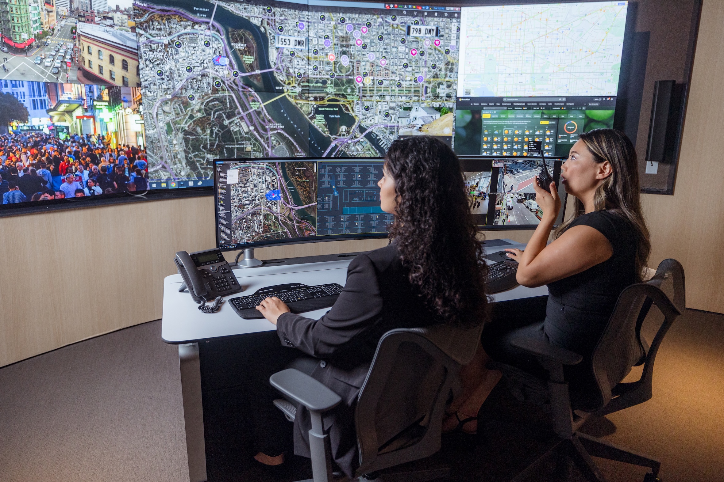 Security operator looking at video wall