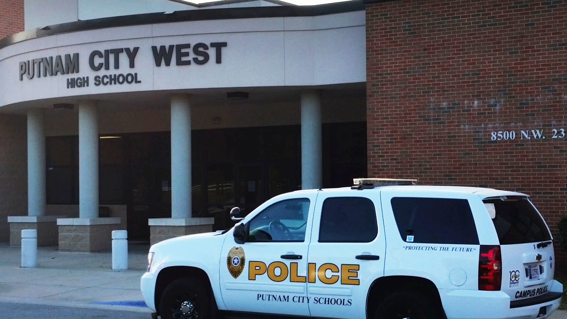 Putnam City Schools police car outside high school
