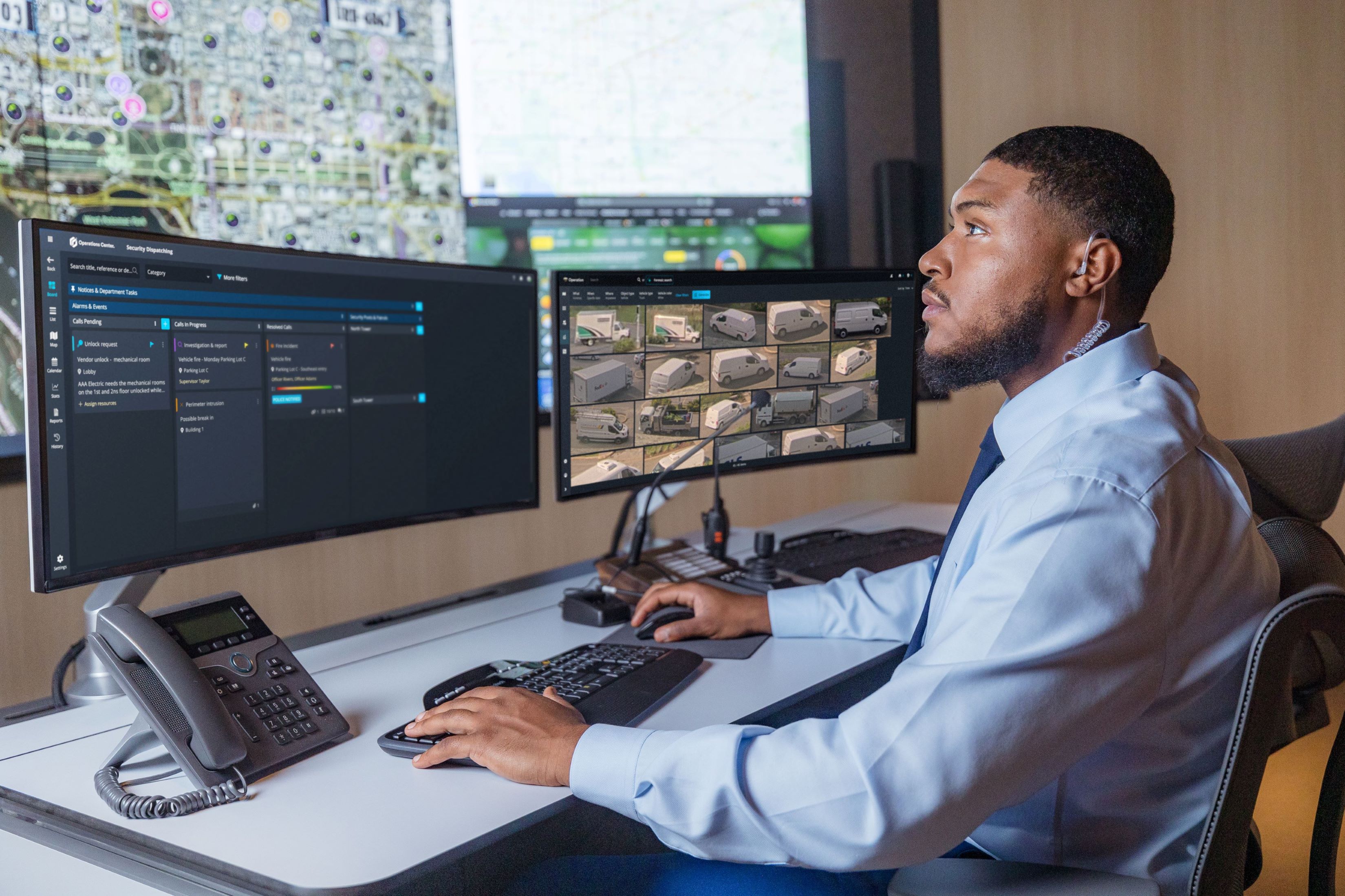 Security operator looking at video wall